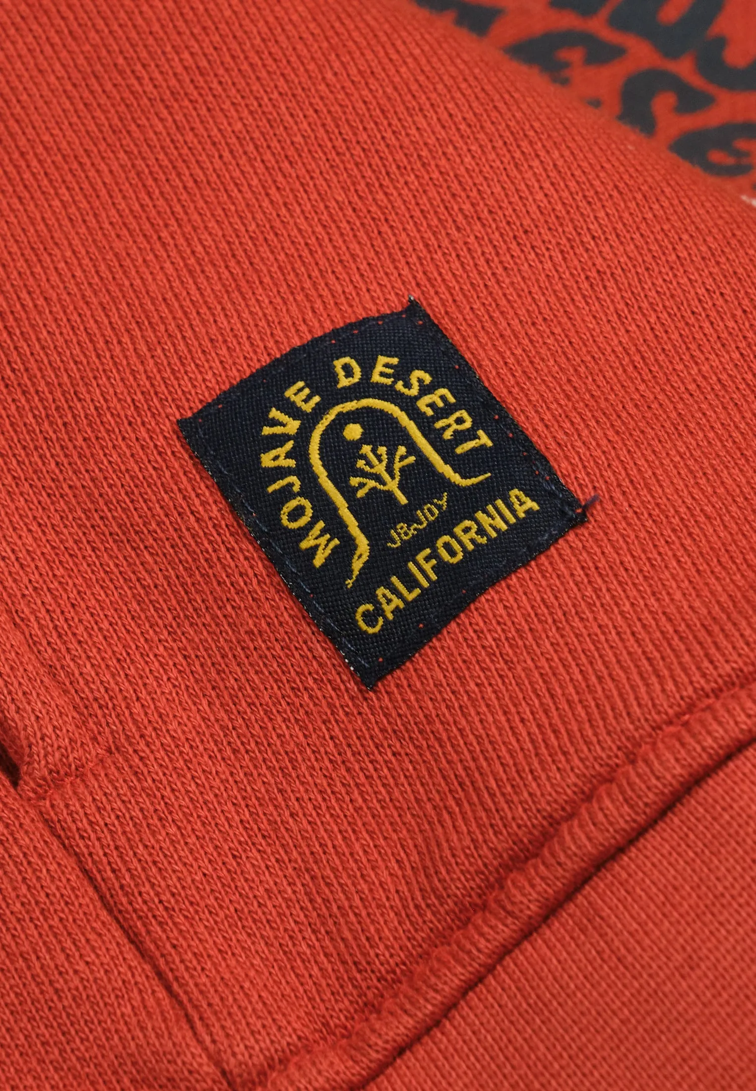 Sweatshirt garon zippé, col montant, orange brique, poches latérales
