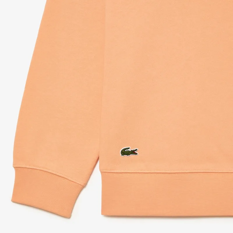 SWEATSHIRT ORANGE COL ROND AVEC INSCRIPTION DANS LE DOS LACOSTE